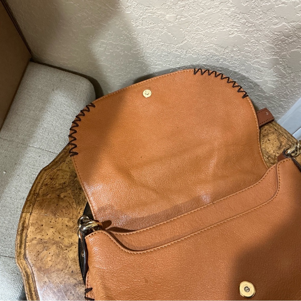 MCM shoulder bag in a tan or cognac featuring gathered flap and whipstitch trim - Picture 9 of 9